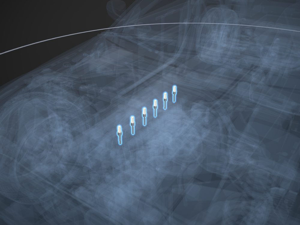 Spark plugs highlighted on the car