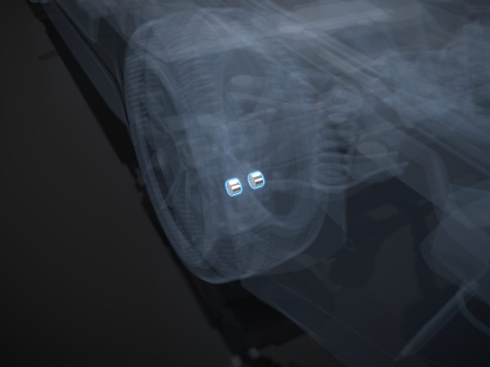 Caliper pistons highlighted on the car